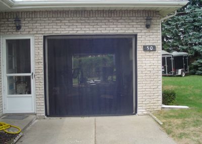 Client using overhead door screen